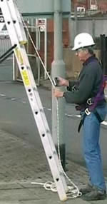 Engineer attaching to Ladder Safety System via Rope Grab