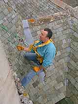 CSS Worksafe Engineer Using Rope Access Techniques to Inspect Fall Arrest Eyebolts at National Trust Property